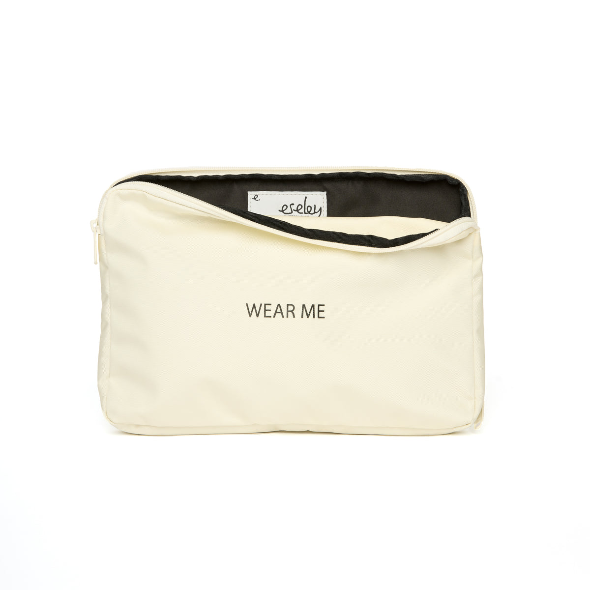 Beige pouch with black interior and 'wear me' text on a white background