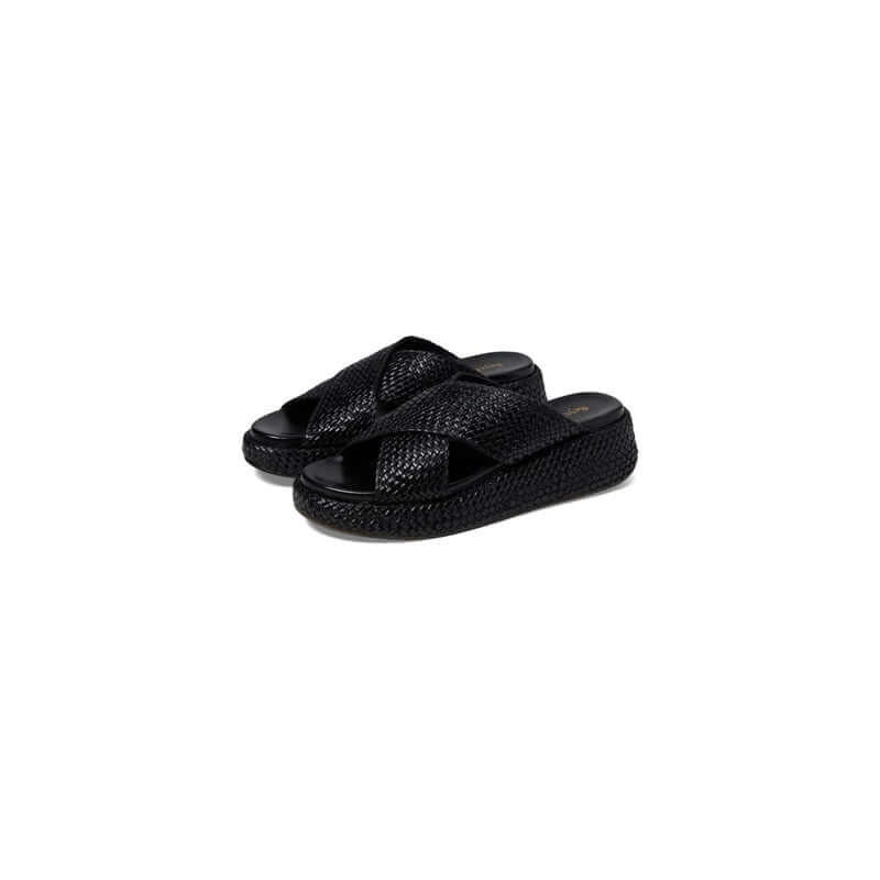 Stylish black braided slip-on sandals with a platform sole, perfect for casual summer outfits.