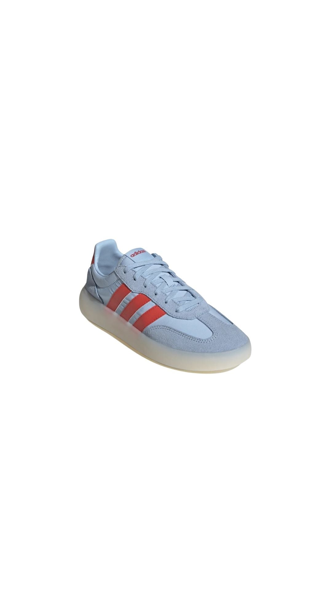 Adidas sneakers in light blue with red stripes, showcasing a classic sporty style for casual wear.