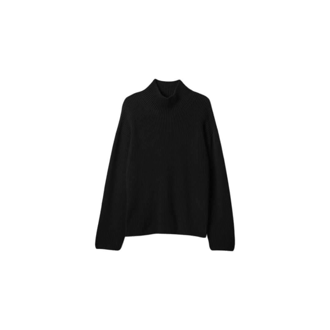 Cozy black ribbed turtleneck sweater ideal for stylish winter outfits.