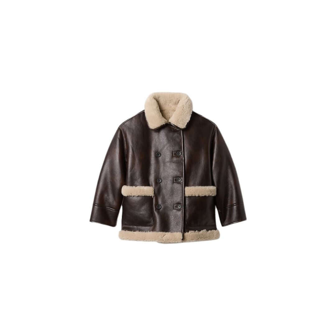 Stylish brown leather jacket with shearling collar and cuffs, perfect for cold weather fashion.