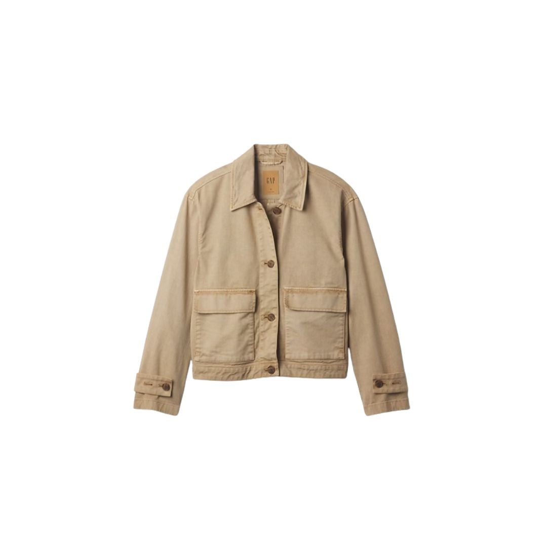 Beige denim jacket with button closure and chest pockets, ideal for casual wear and seasonal layering.