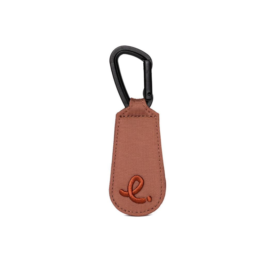 leather brown hat clip with black carabiner on a white background