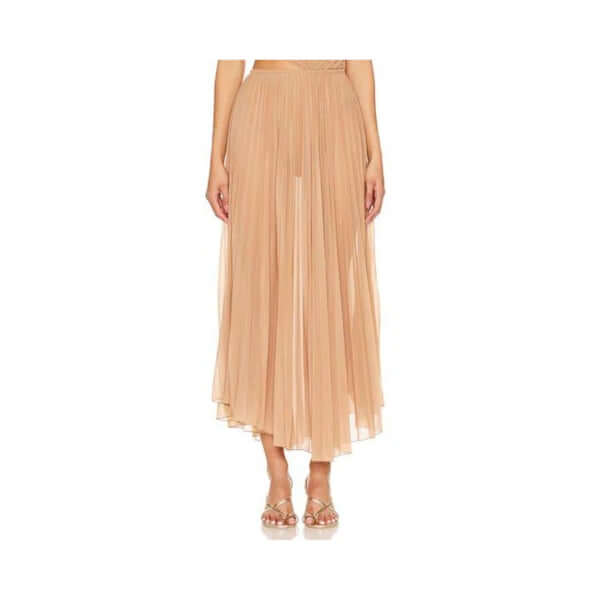 Pleated nude maxi skirt on model, showcasing elegant style and flowy design for modern fashion.