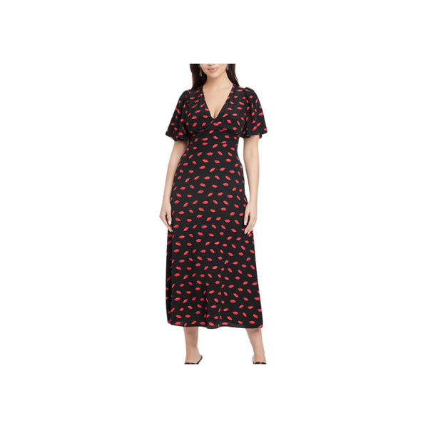 Woman in black maxi dress with red lip print, showcasing fashion-forward style and modern elegance.