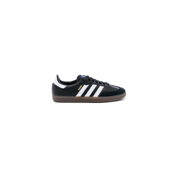 Adidas black and white sneakers with a classic design and rubber sole, perfect for casual wear.