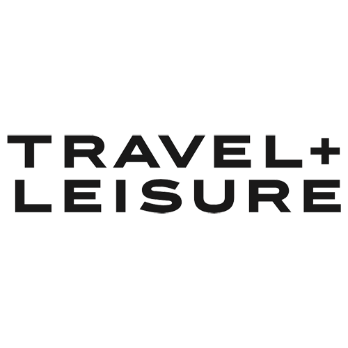 Travel + Leisure logo showcasing travel experiences and lifestyle, emphasizing adventure and relaxation.