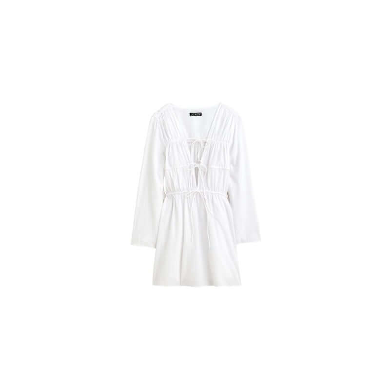 Stylish white dress with gathered details and long sleeves, perfect for casual outings or summer wear.