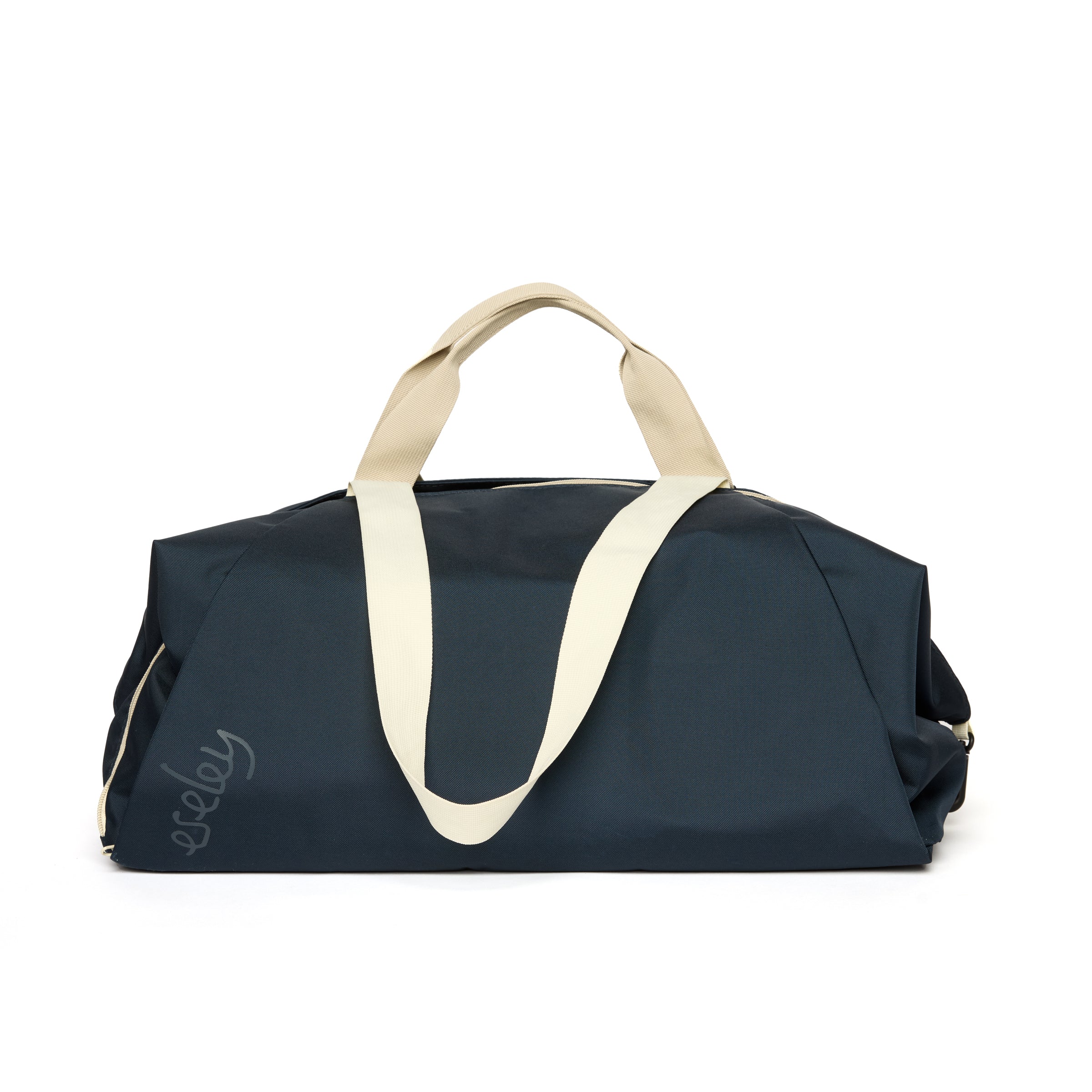Navy duffel bag with beige handles on a white background
